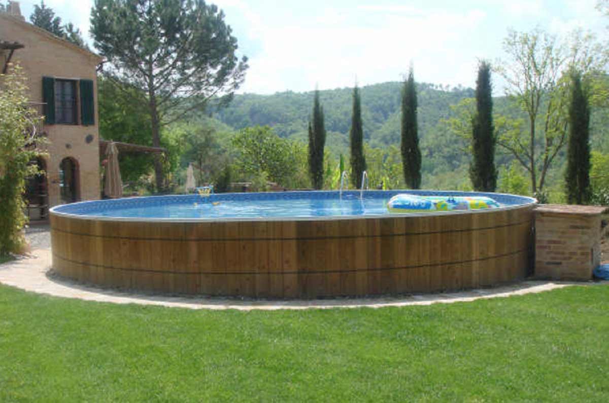 large wooden round above ground pool